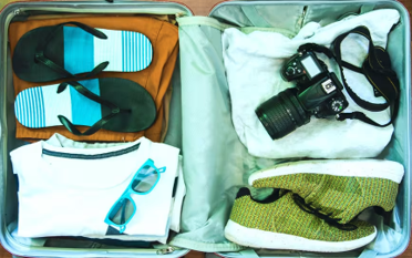 A bag of clothing & vacation items